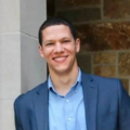 financial advisor standing taking a headshot